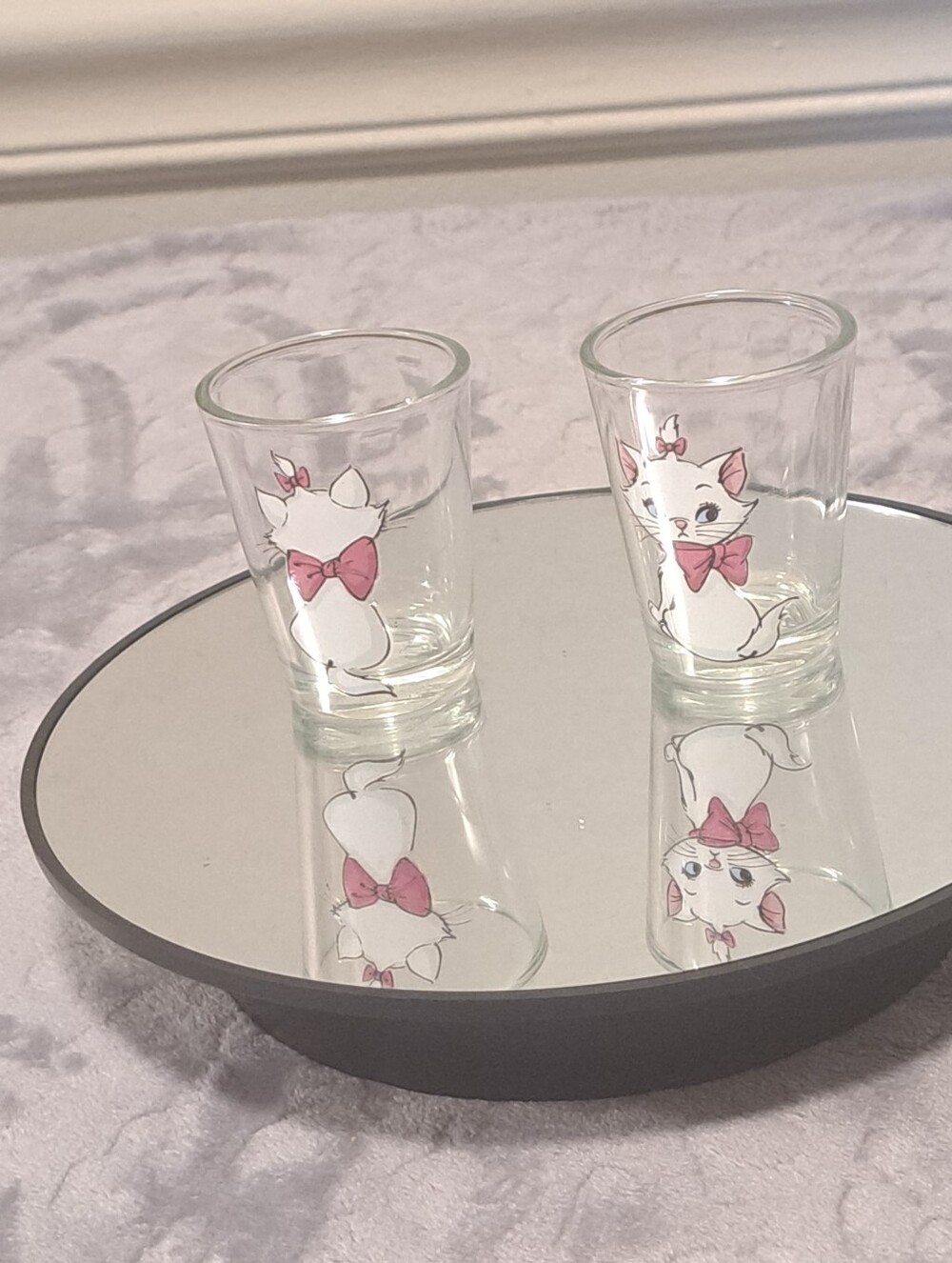 Set of 2 Disney's. The Aristoca Clear Glass Shot Glasses with Bow Kitten Design
